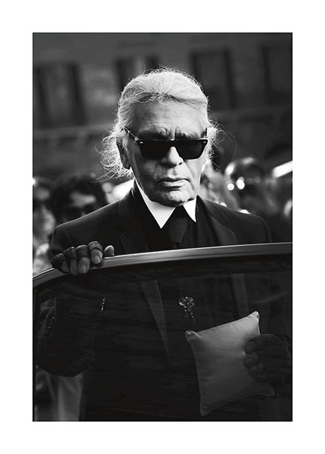 karl lagerfeld poster|karl lagerfeld on black background.